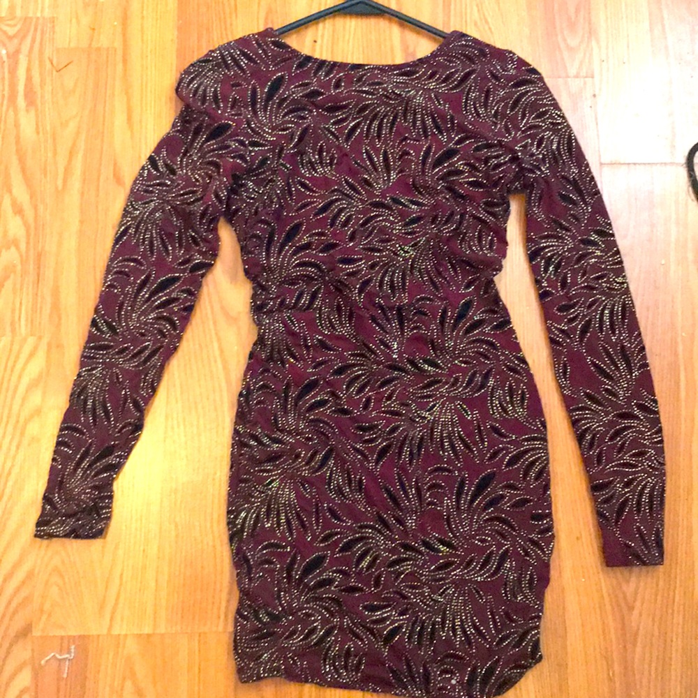 Beautiful burgundy mini dress with swoop back
